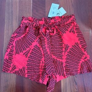Brand new with tags, red Manaola shorts